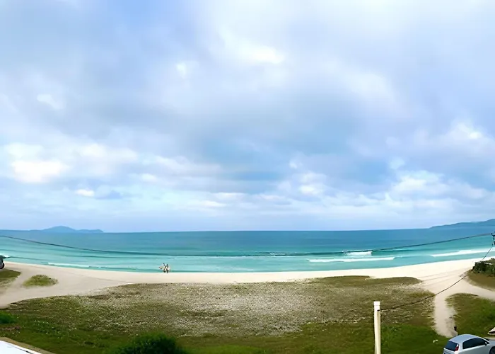 Cobertura pé na areia, Churrasqueira, Varandão, Ar condicionado